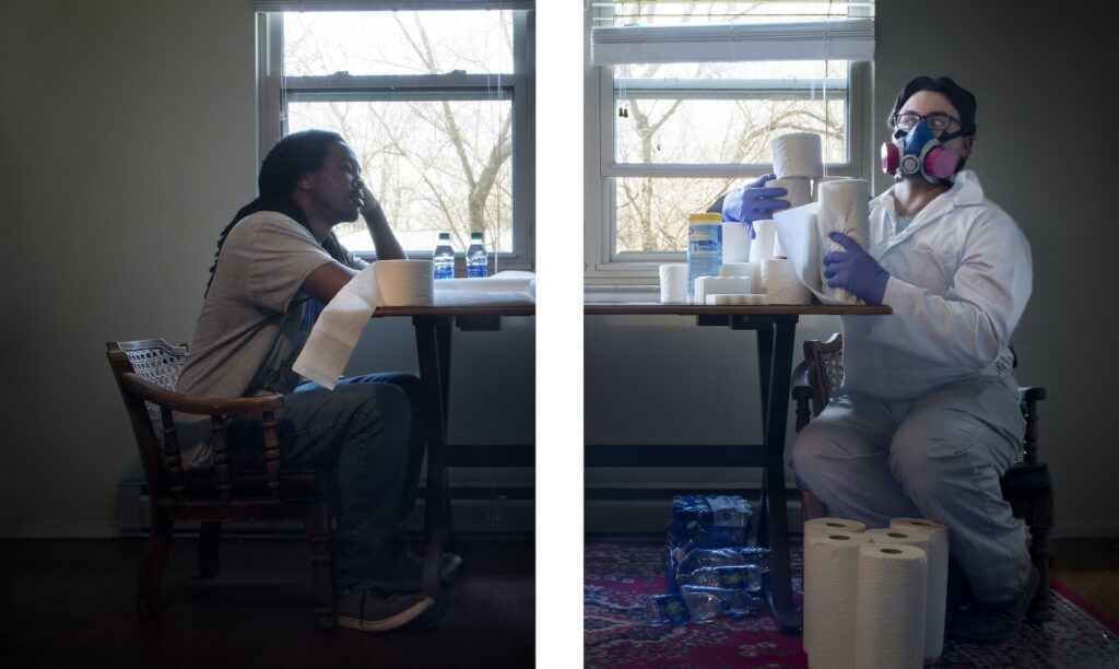 "Please Practice, Racial Distancing" by Joel Fuller, Just Injust 2021, diptych of two men sitting at a table, black man to the left resting his head in his hand, white man on right with hazmat suit and hoarded toiletries and lockdown supplies