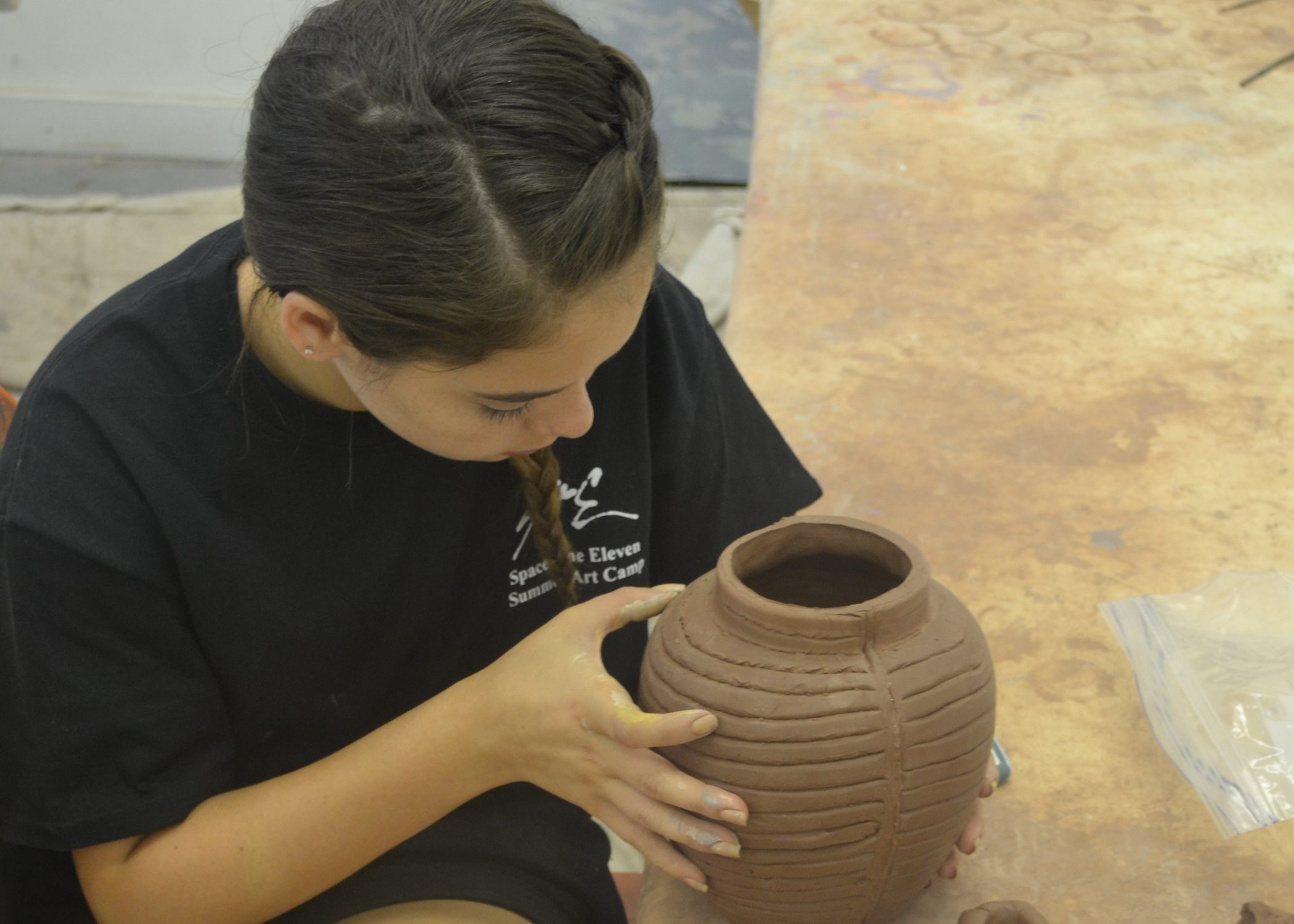 copy_Clay Sculpture Workshop Student sculpting clay - SPACE ONE ELEVEN